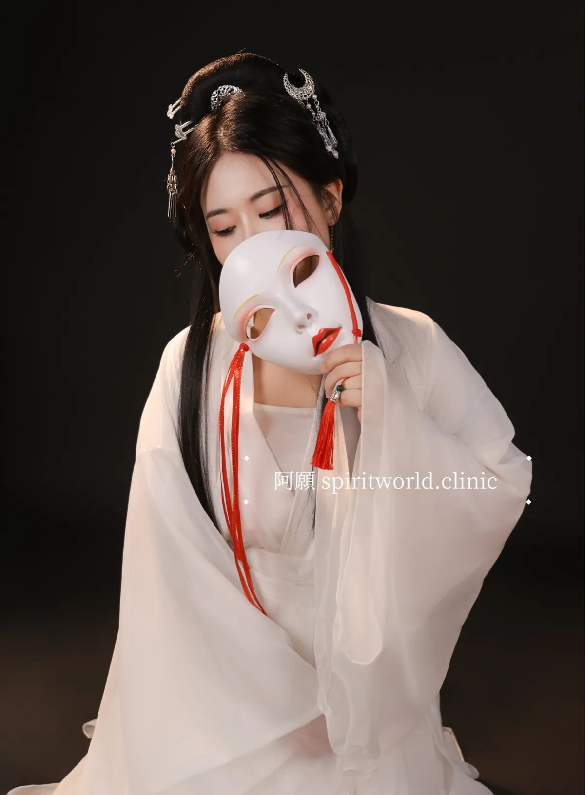 Ah Yuan holding a mask
